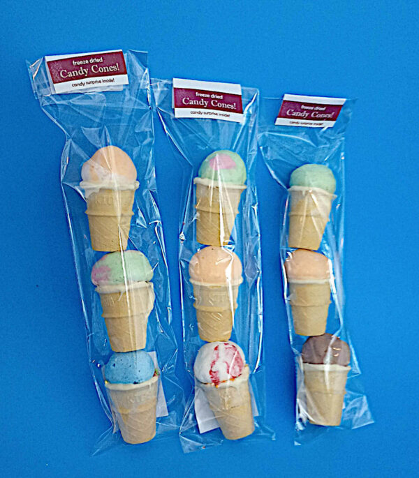 three bags of candy cones